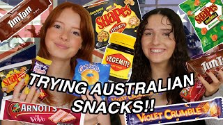 Trying AUSTRALIAN CANDY  Girls Tasting Snacks from Australia TIMTAMS VEGEMITE SHAPES ICED VOVOS [upl. by Ecnerolf]