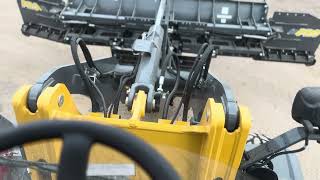 How to operate the new massive Snowex Power Pusher winged plow [upl. by Aileduab707]