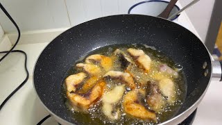 Fresh grass carp cut into chunks and fried in oil [upl. by Solana]