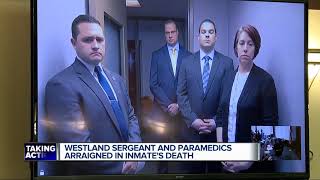 Westland police sergeant two EMTs charged in death of jail inmate [upl. by Atterahs890]