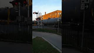 CN 2868 East Passing By Brampton GO Station In Brampton Ontario 100624 [upl. by Khalin]