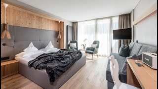 Hotel Alpenheim  Rooms and suites in Ortisei with views of the Sassolungo  Winter [upl. by Beniamino]