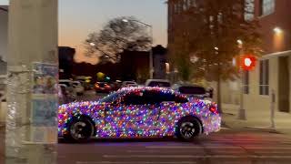 A car wrapped with Christmas lights [upl. by Eahsat]