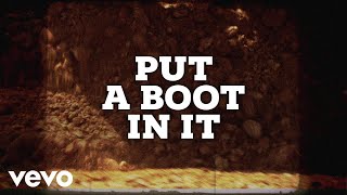 Justin Moore  Put A Boot In It Lyric Video [upl. by Elyl]