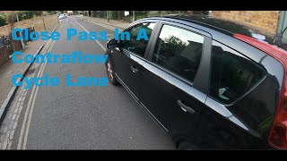 PK59 UUW  Close Pass In A Contraflow Cycle Lane [upl. by Pogue432]