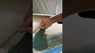 Applying Bondo glass fiberglass filler [upl. by Woolson]