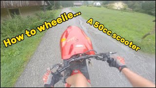 How to wheelie a 50cc scooter tutorial [upl. by Kathleen622]