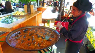 Spanish Guy cooks Paella with much Love at Market  Street Food in Berlin Germany [upl. by Alracal]