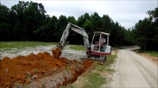 Trenching with the Mini Excavator [upl. by Underwood961]