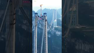 WORLDS FIRST LONGEST BRIDGE 2025 under CONSTRUCTION  Huajiang Gorge BRIDGEbridge infrastructure [upl. by Nyvek]