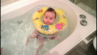 BABY NECK FLOAT our 10 week old baby swimming in the bath for the first time [upl. by Eanert296]