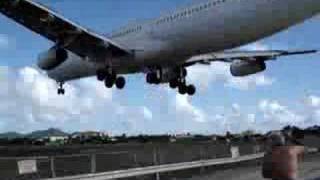 SUPER LOW St Maarten Air France A340 Landing bounces [upl. by Nolyag]