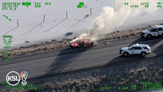 POLICE CHASE Car catches on fire while fleeing from Utah Highway Patrol [upl. by Izogn381]