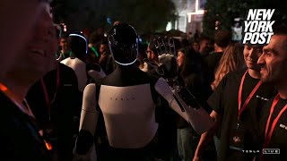 Elon Musk’s Optimus humanoid robots steal show at Tesla event ‘Will be the biggest product ever’ [upl. by Remy]