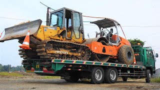 Soil Compactor And Bulldozer Transport With Fuso Self Loader Truck [upl. by Quartis291]