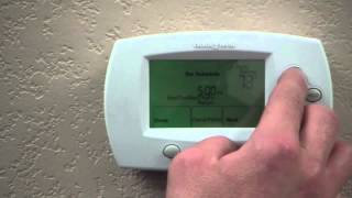 How to program a digital thermostat  Danville HVAC company [upl. by Noitna518]