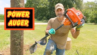 Digging Post Holes With Powered Earth Digger [upl. by Nalo]