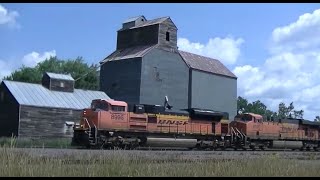 BNSF SD70ACe leads westbound coal racing past the old elevator at Eldridge ND [upl. by Nameloc]