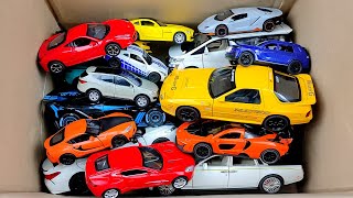 BOX FULL OF Model Cars Honda Civic Bugatti Divo McLaren 650s Audi Rs7 Ford Raptor Ferrari sf90 [upl. by Eillah]