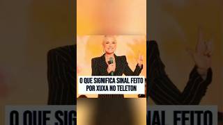 Sinal feito por xuxa no Teleton divide opiniões mais o que significa fofocas noticiaspopulares [upl. by Ennoitna657]