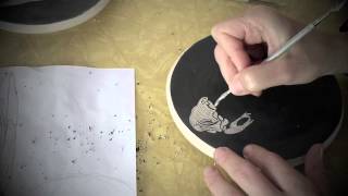 Raven skull Sgraffito on a handthrown trivet [upl. by Otrevogir]