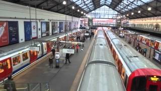 8 District Line trains at Earls Court [upl. by Suryc]