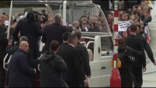 Watch the moment protester runs out in front of popemobile during Francis Luxembourg visit [upl. by Ecirtnas]