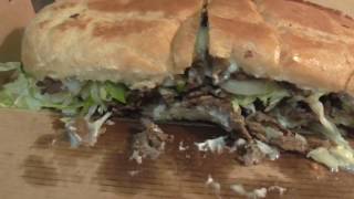 Food Reviews Mancinos Steak And Cheese Grinder Sandwich Awesome Food To Eat Alpena Michigan [upl. by Bobette509]