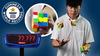 Fastest Juggle and Solve of Three Cubes EVER  Guinness World Records [upl. by Nishom484]