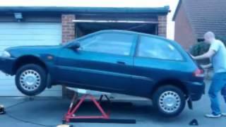 MINI TILTING CAR LIFT CL03 SUPPLIED BY CJ AUTOS [upl. by Nunciata624]