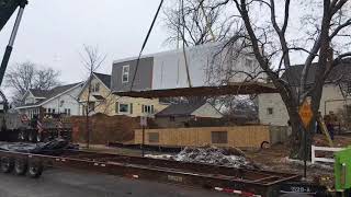 Crane lifts modular home onto foundation [upl. by Asyla]