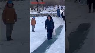 Visiting Southerners vs native Northerners in ice gliding in NE China [upl. by Tuinenga572]