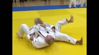 Putin Spars With Russian Judo Team [upl. by Halehs]