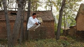 Chinese Martial Artist Can Breathe While Hanging by His Neck from a Tree Li Liangbin [upl. by Tnilc32]