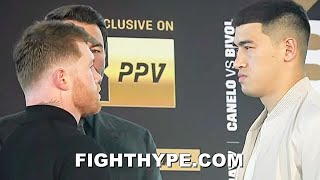 CANELO amp DMITRY BIVOL INTENSE FIRST FACE OFF CANELO STARES DOWN BIG SIZE DIFFERENCE [upl. by Lekcim]