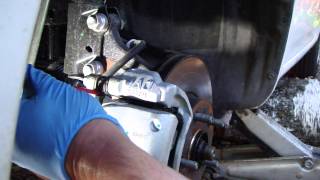 How to change front brake pads Toyota Corolla Years 2008  2013 [upl. by Kobe]