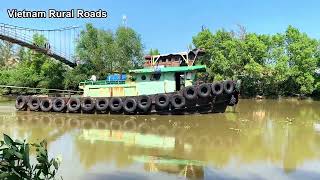 Tugboat tugs barges on river in western Vietnam [upl. by Nivla]