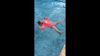 Baby falls into pool and back floats on her own [upl. by Etteraj]