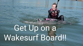 How to get up on a wakesurf board  Wakesurfing Tips [upl. by Oinotnaocram]