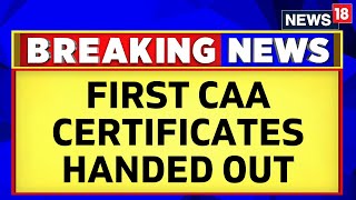 CAA  Centre Issues First Set Of Citizenship Certificates Under CAA To 14 Applicants  News18 [upl. by Aramen]