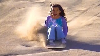 Sandboarding and Sand Sledding at Great Sand Dunes [upl. by Kallista925]