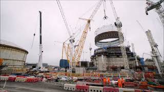 Giant crane lifts 423tonne steel liner ring into position at Hinkley Point C [upl. by Atikahc]