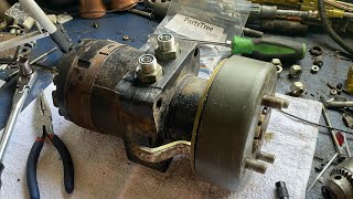 Replacing the shaft seal on a hydraulic wheel motor [upl. by Ambie]