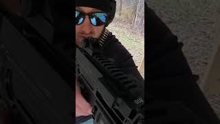 Running a beltfed 556 fightlite beltfed binarytrigger shooting [upl. by Notse486]