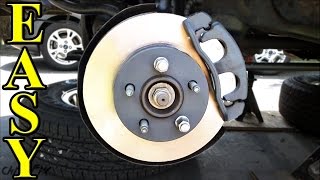 How to Replace Front Brakes Pads and Rotors [upl. by Arikat]