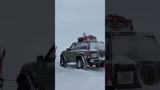 Rescue operation in ArcticRescues KAMAZ 6x6 fuel tanker from snow captivity 6x6 бездорожье truck [upl. by Ahsatam]