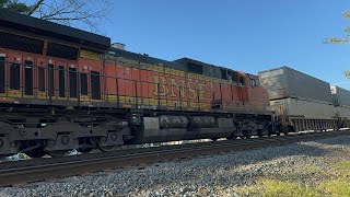 NS 1012 SD70ACE leads NS 22X through Manville NJ with a BNSF H2 C449W trailing 4232024 [upl. by Aniakudo540]