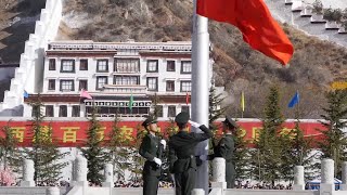 GLOBALink  Flagraising ceremonies held in Chinas Tibet to celebrate Serfs Emancipation Day [upl. by Simonette]