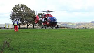 DHDSL H145 of DRF Luftrettung landing unloading a rescued person and departing [upl. by Nehgem]