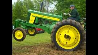 John Deere 620 pulling stoneboat with big concrete block 2 [upl. by Berky531]